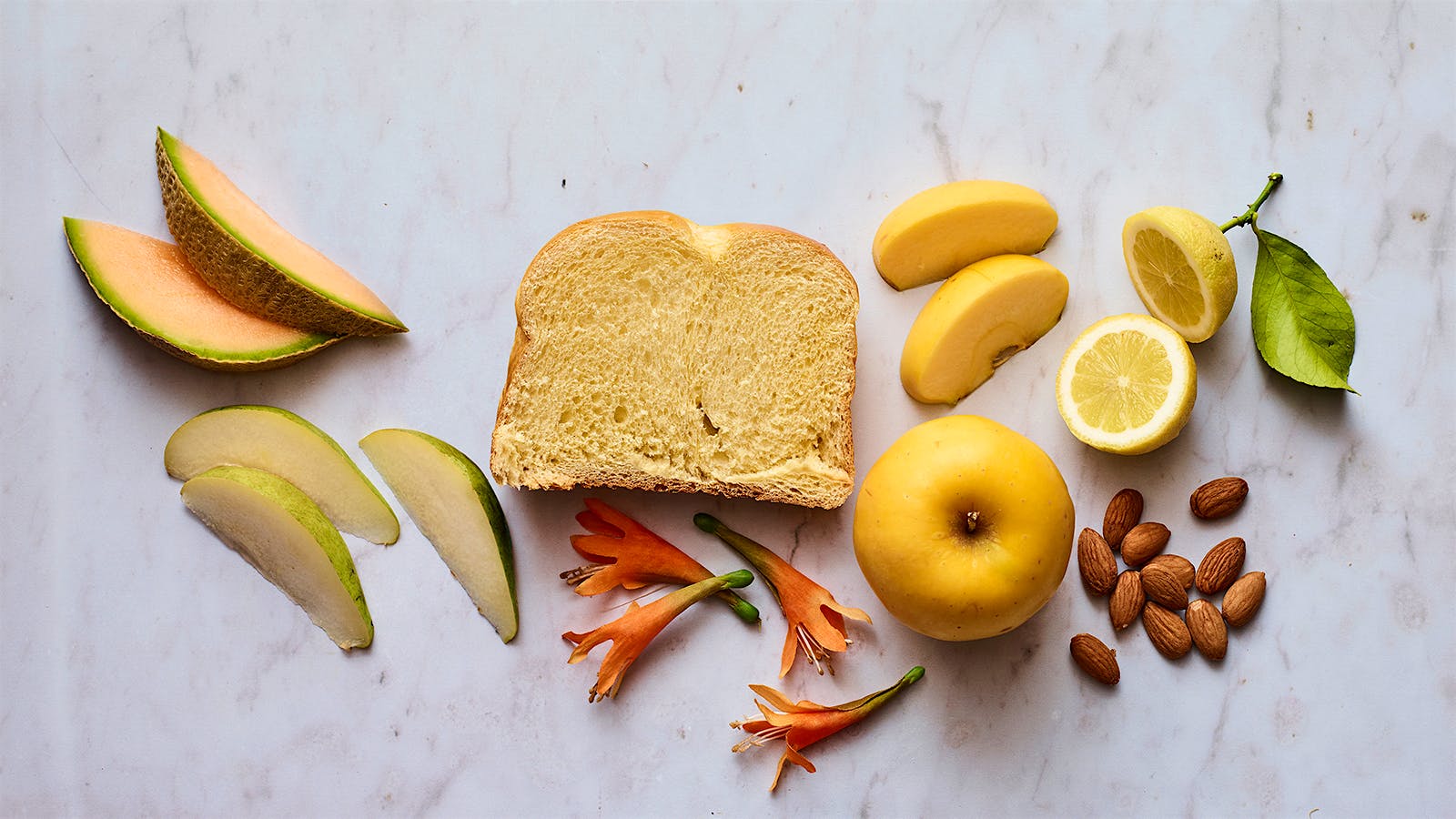 Melon, pear, brioche, honeysuckle, yellow apple, lemon, almond