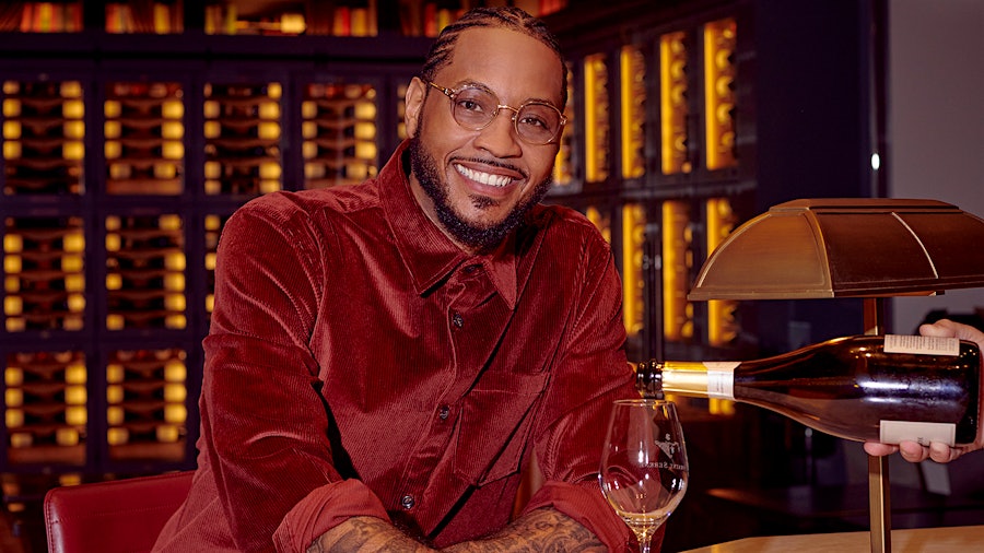 Carmelo Anthony with a glass of wine. Photo credit: Meron Menghistab