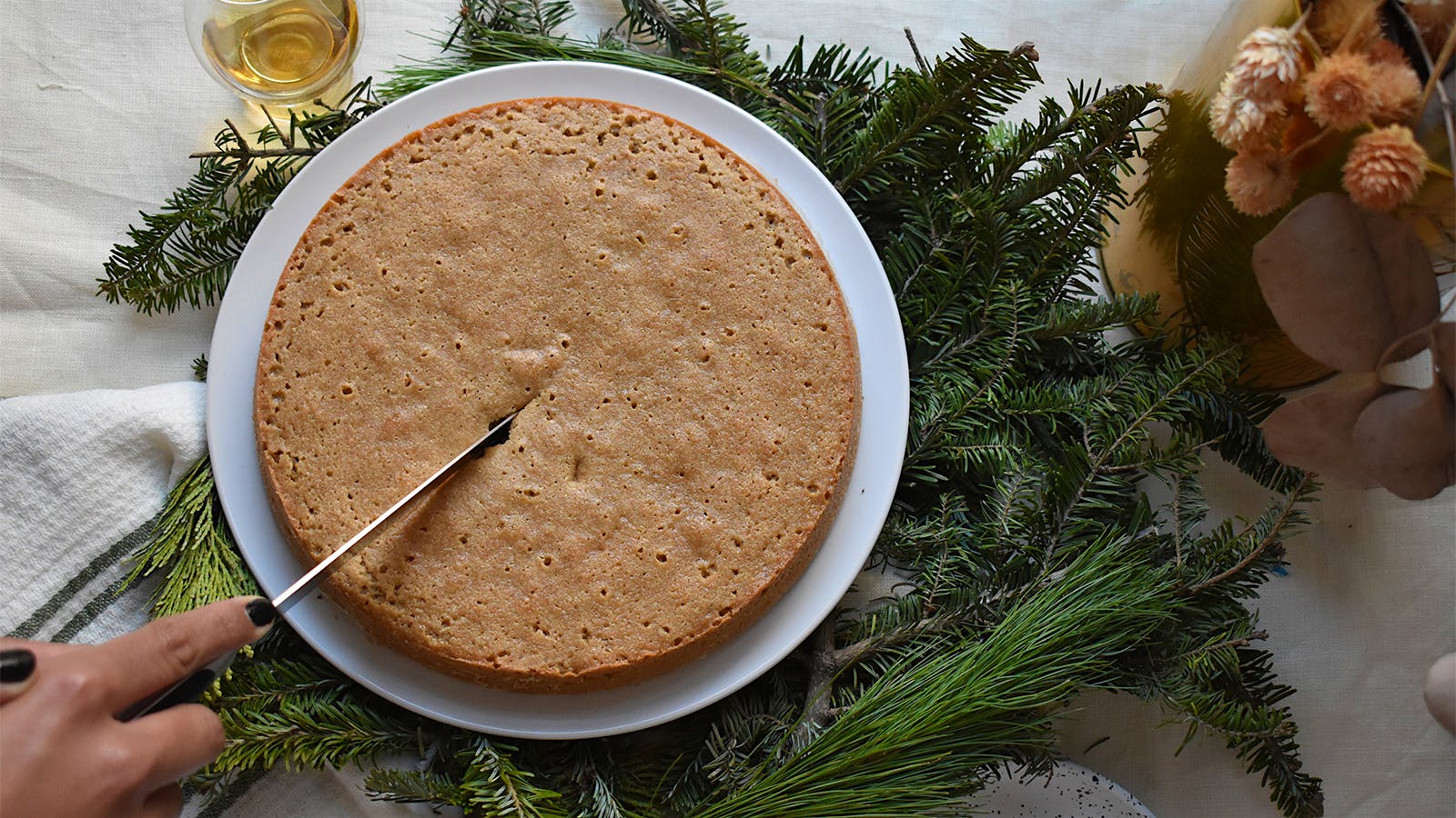 French chestnut cake on a bed of pine fronds