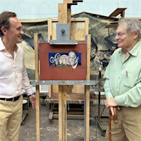 Julien de Beaumarchais de Rothschild, left, and Gérard Garouste look at the artist's painting for the 2022 Mouton-Rothschild vintage.Mouton-Rothschild Pays Tribute to the Late Baron Philippe with New Label