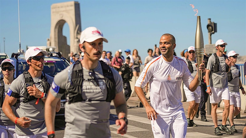 French Vintners Carry the 2024 Paris Olympic Torch